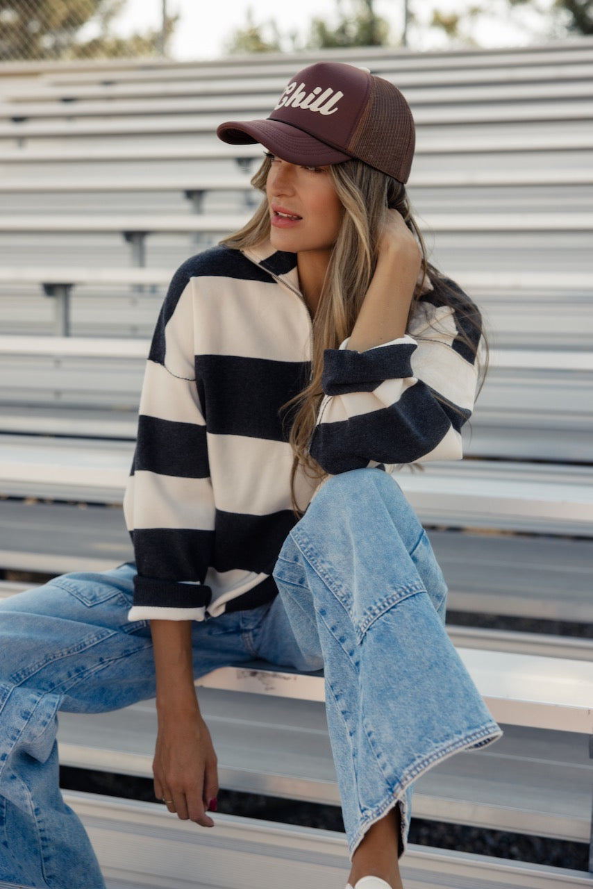 a woman sitting on a bench