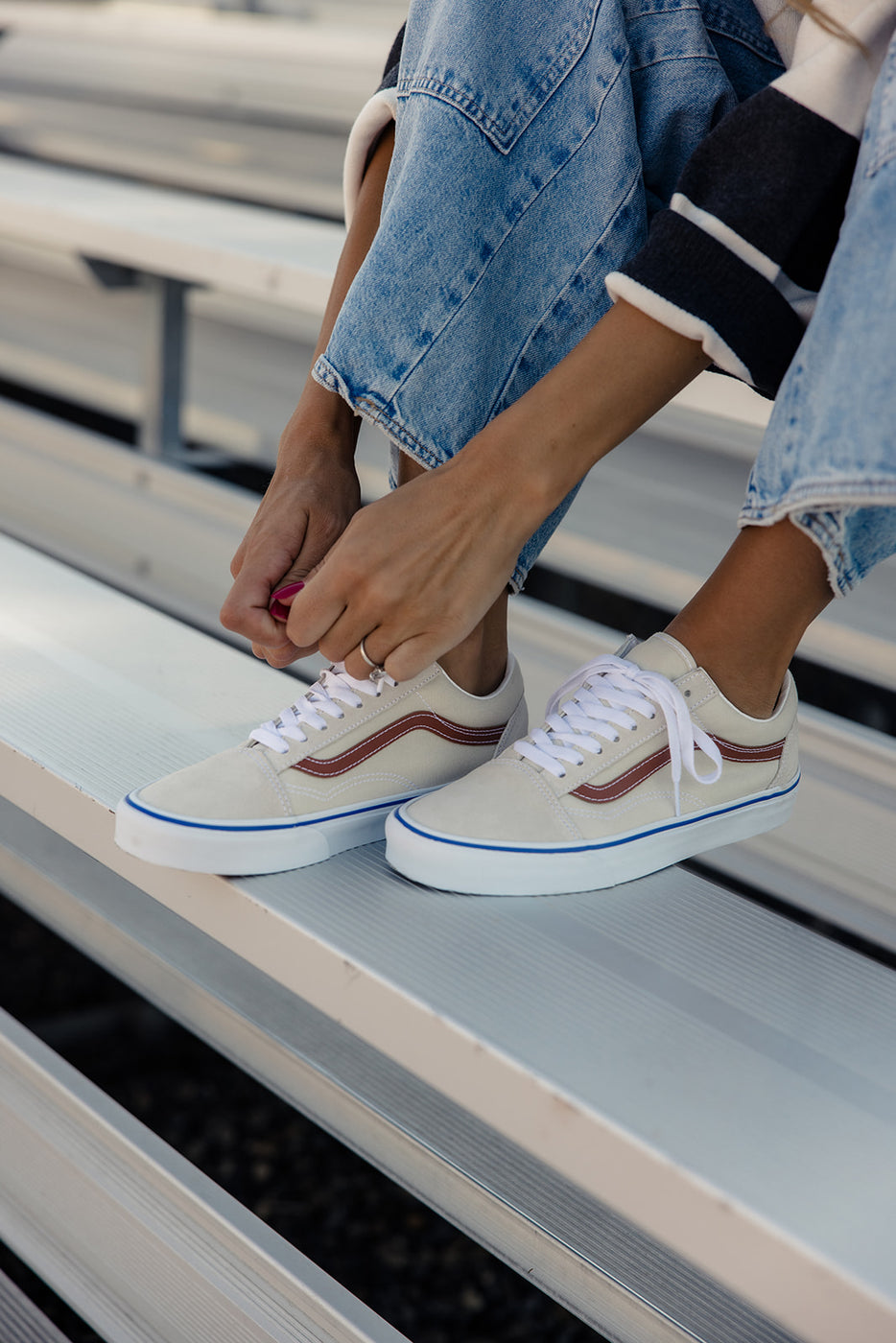 a person tying their shoes