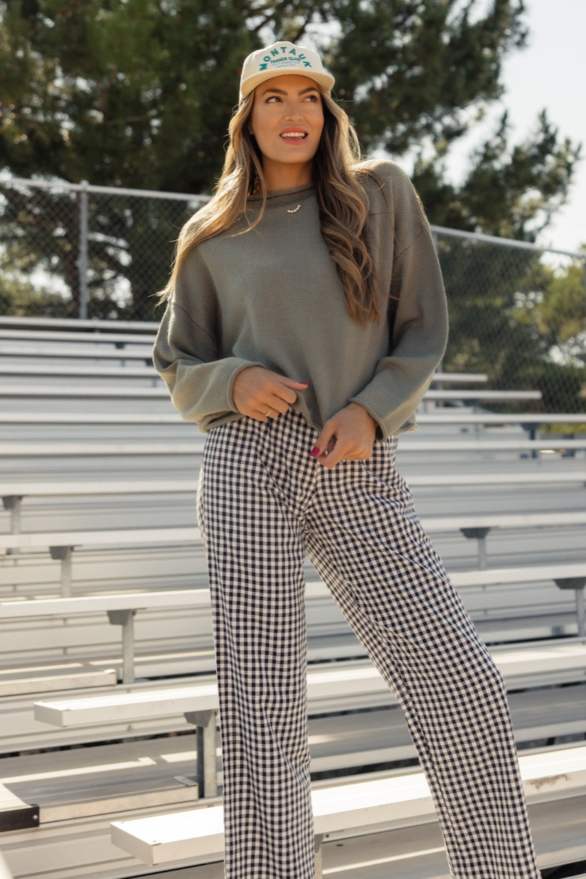 a woman standing in a stadium