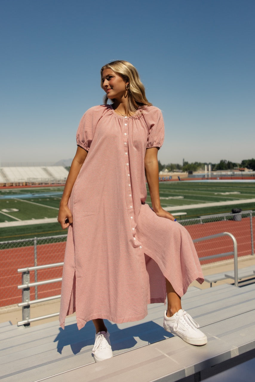 a woman in a pink dress