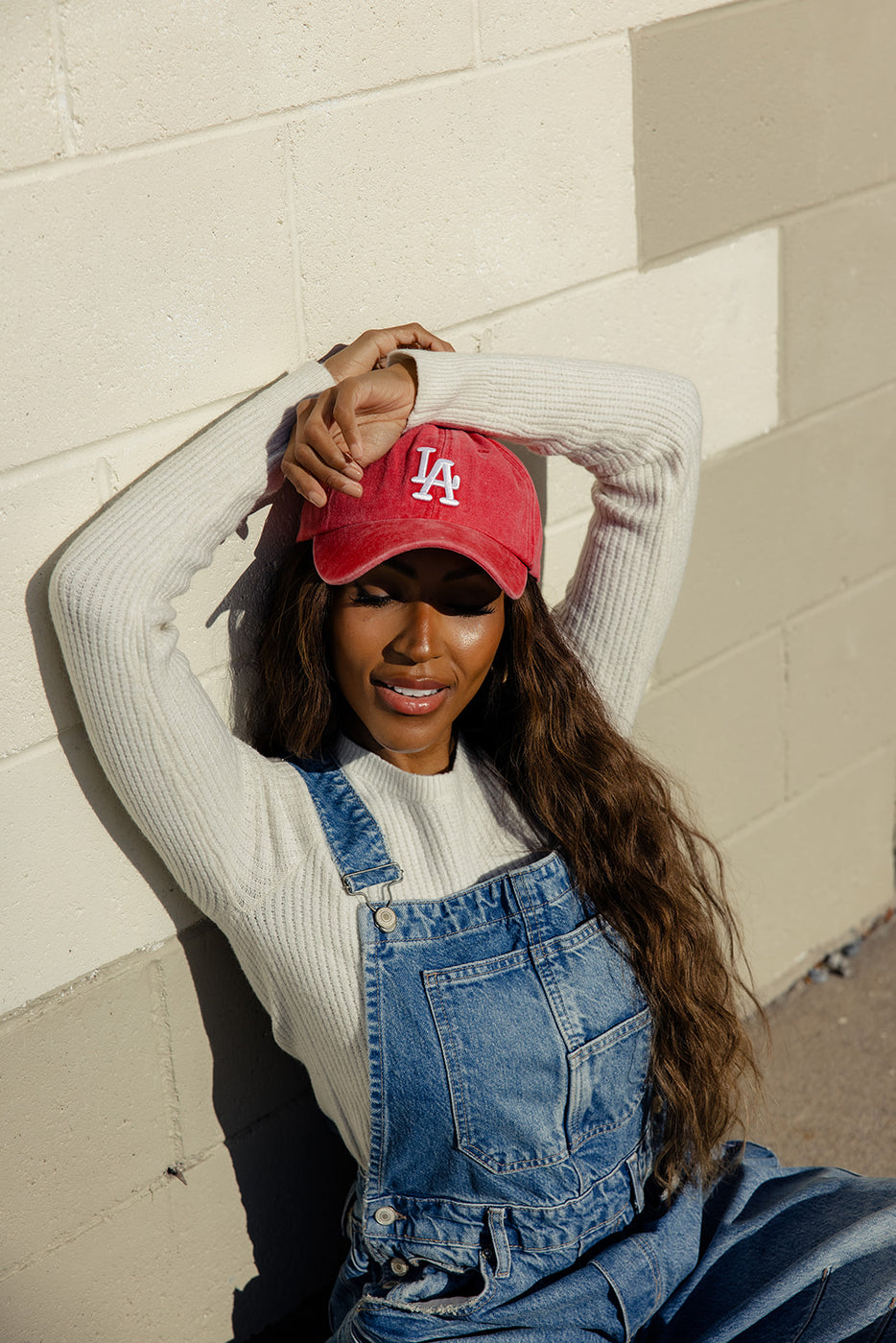 a woman wearing a red hat