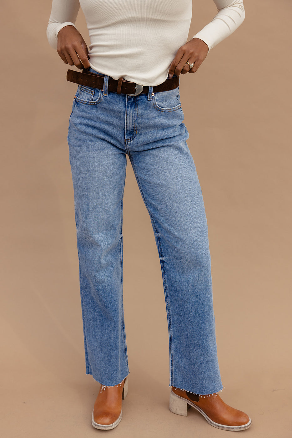 a person wearing blue jeans