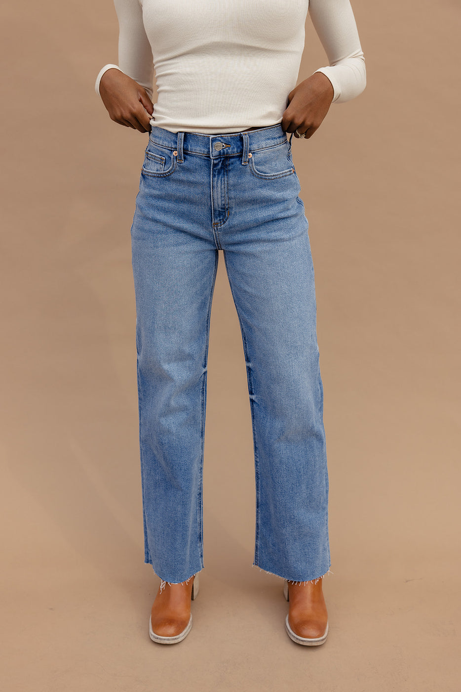 a person wearing blue jeans