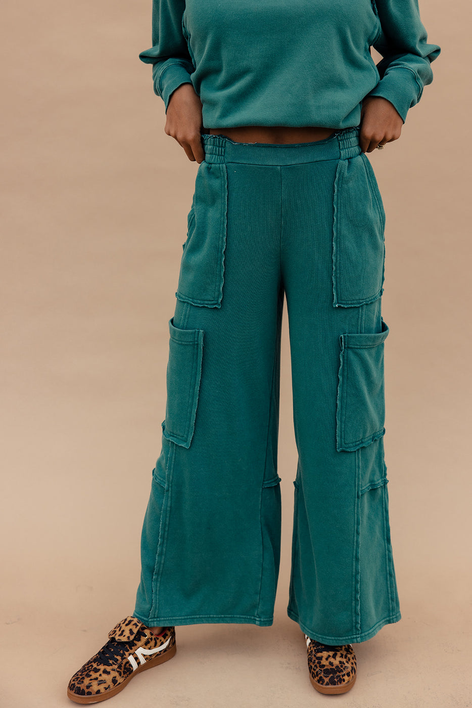 a person wearing a green pants