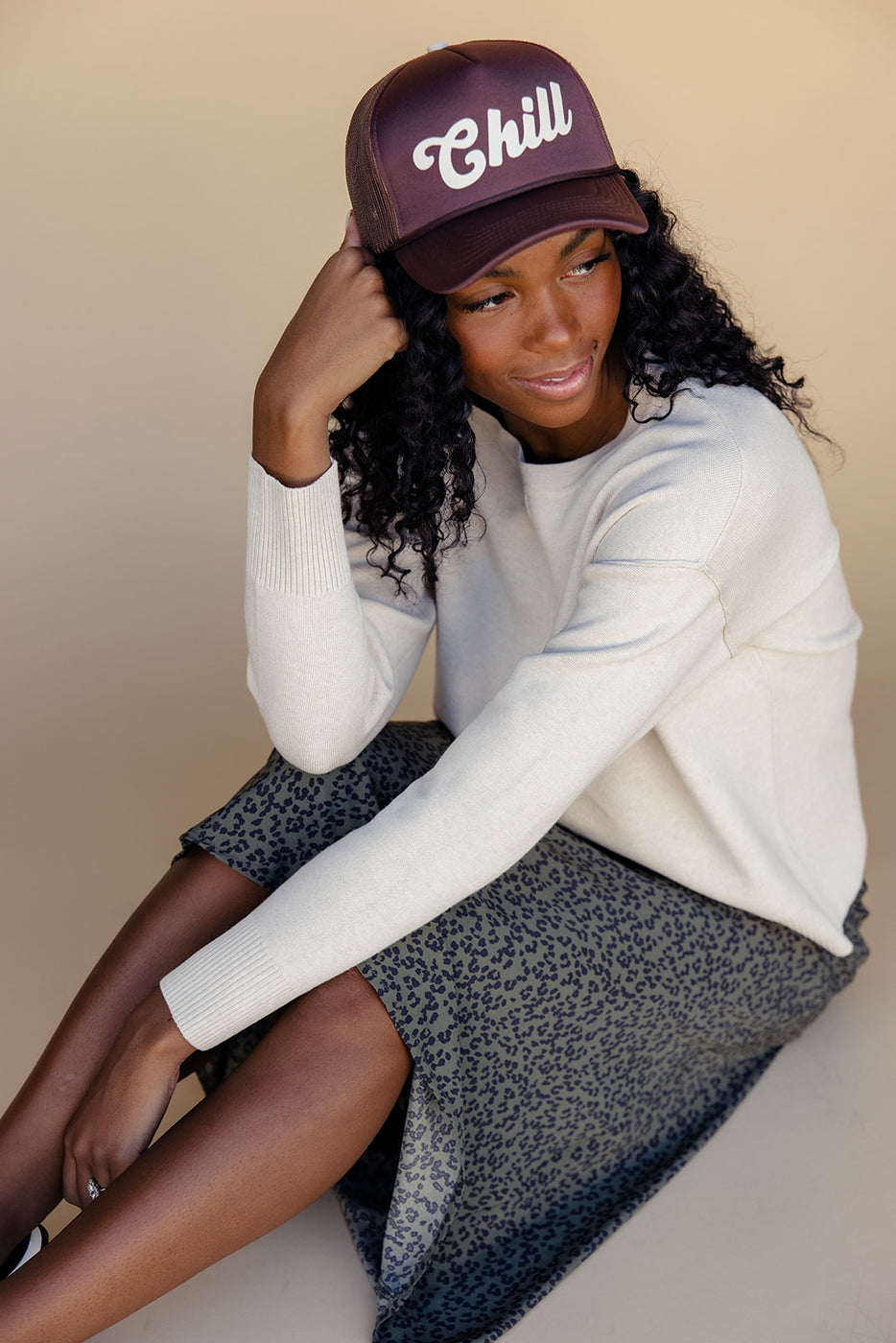 a woman sitting on the floor