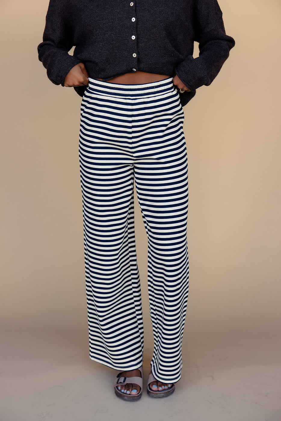 a person wearing striped pants