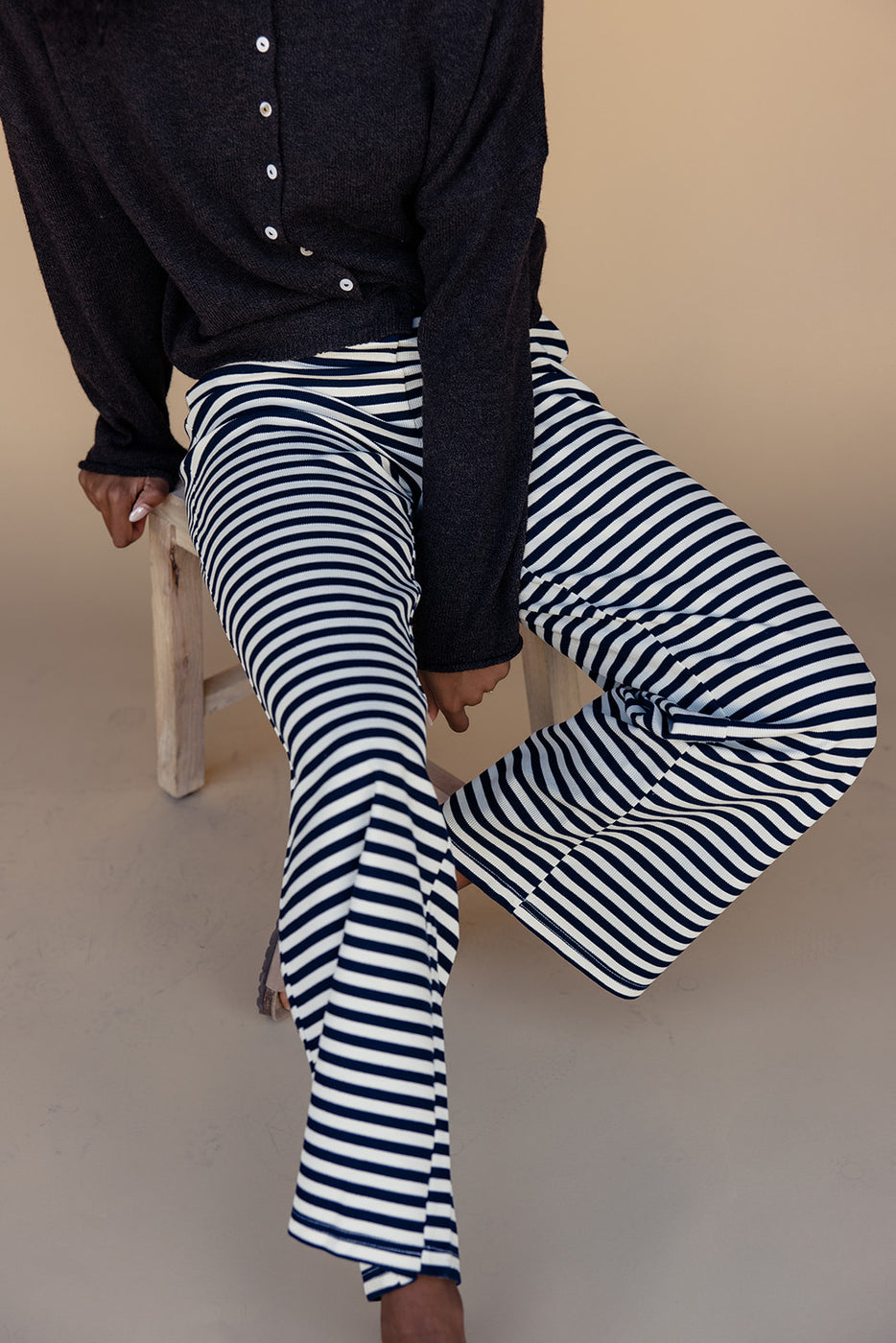 a person wearing striped pants