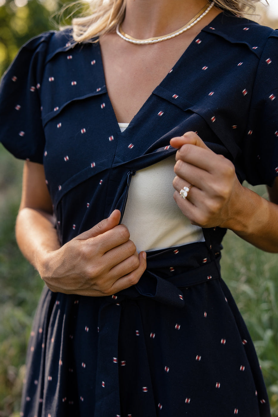 a woman opening her dress