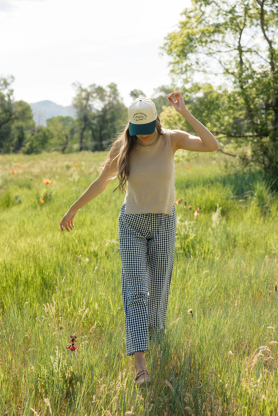 a woman in a field of grass