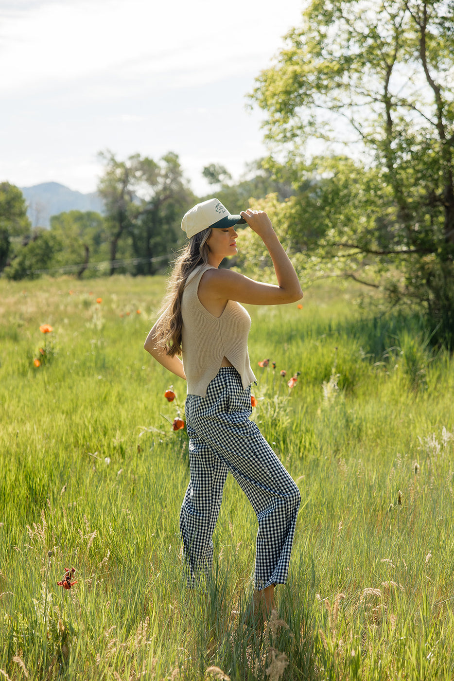 a woman in a field of grass