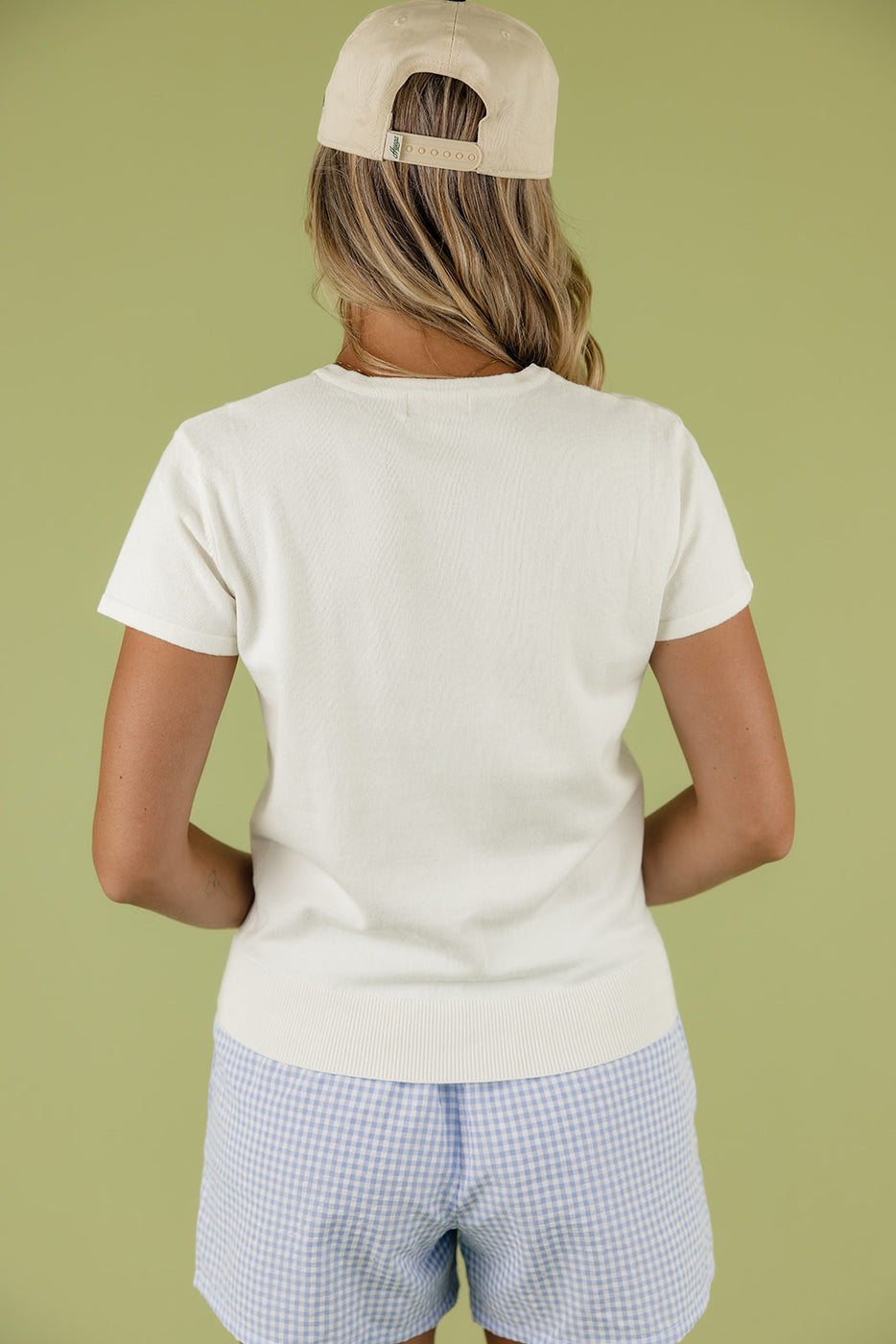 a woman wearing a white shirt