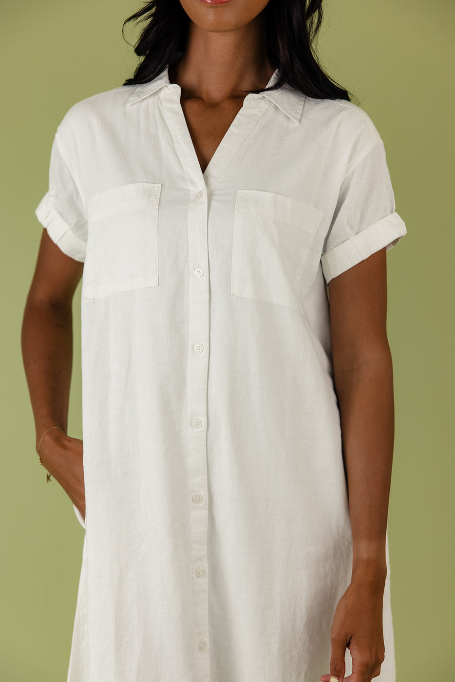 a woman wearing a white shirt