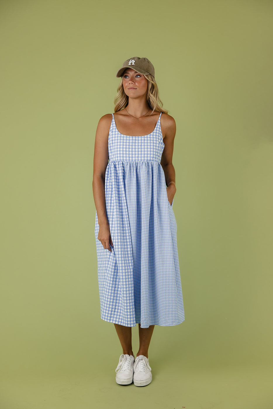 a woman in a blue and white dress