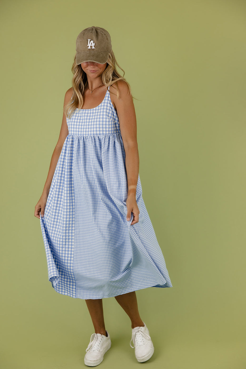 a woman in a blue and white dress