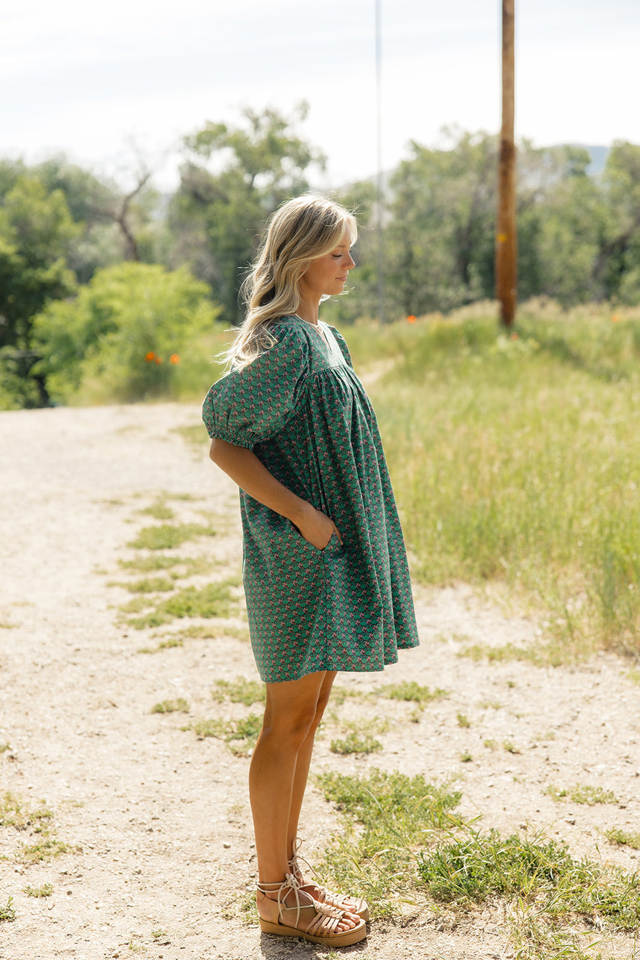 a woman in a green dress