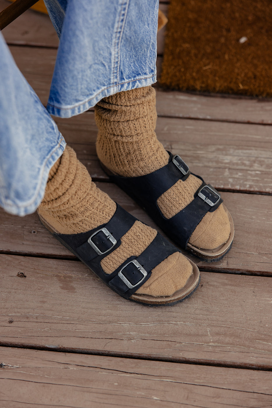 a person wearing sandals and socks