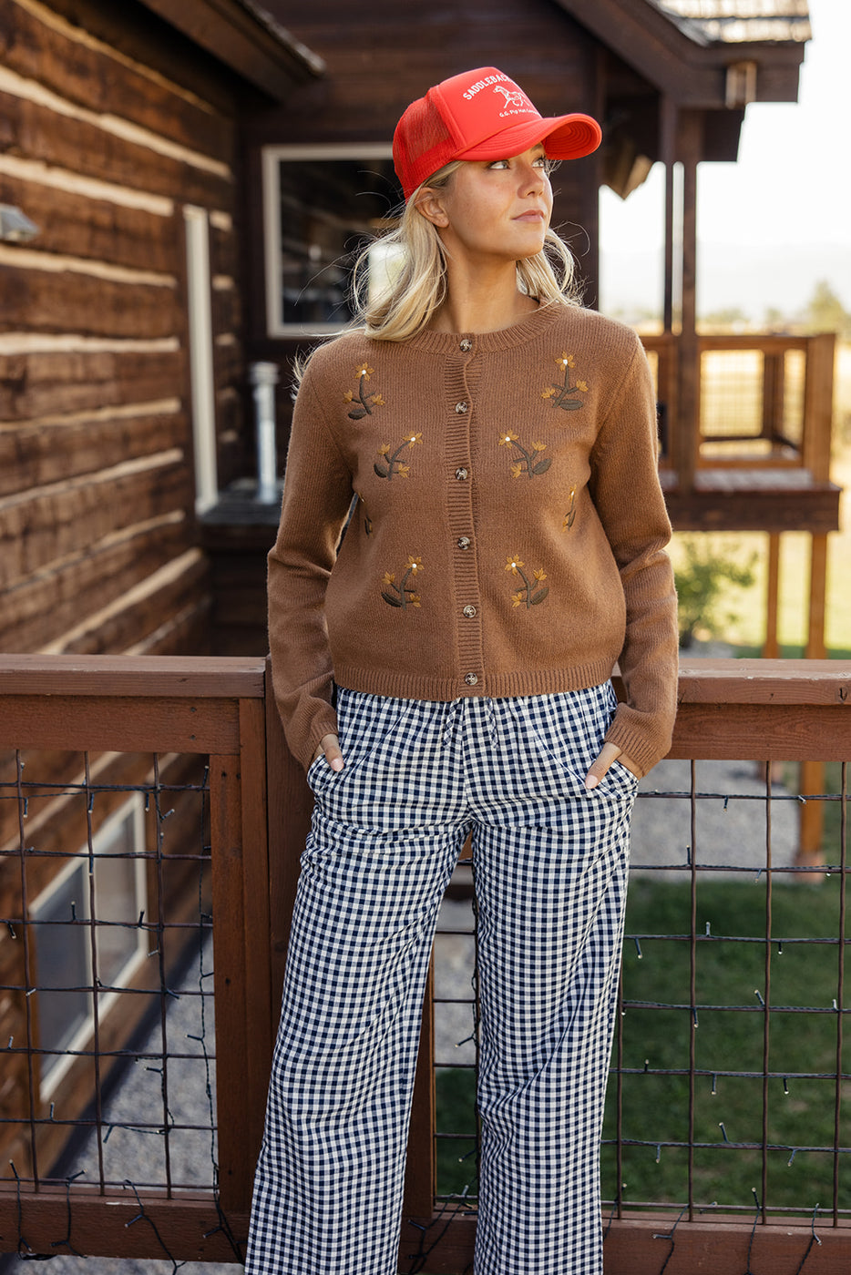 a woman standing on a deck