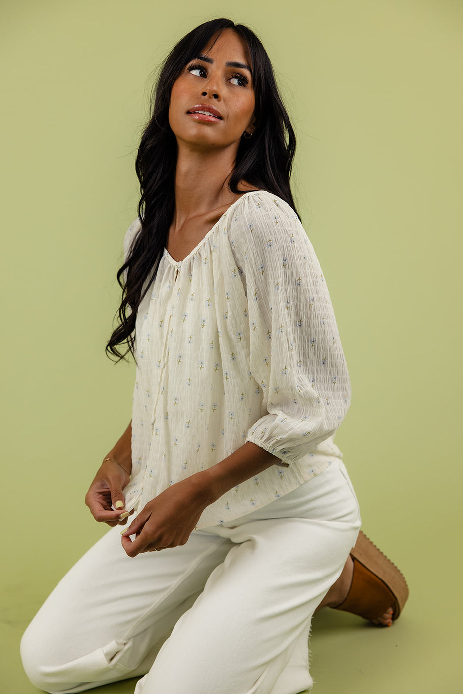 a woman sitting on a chair