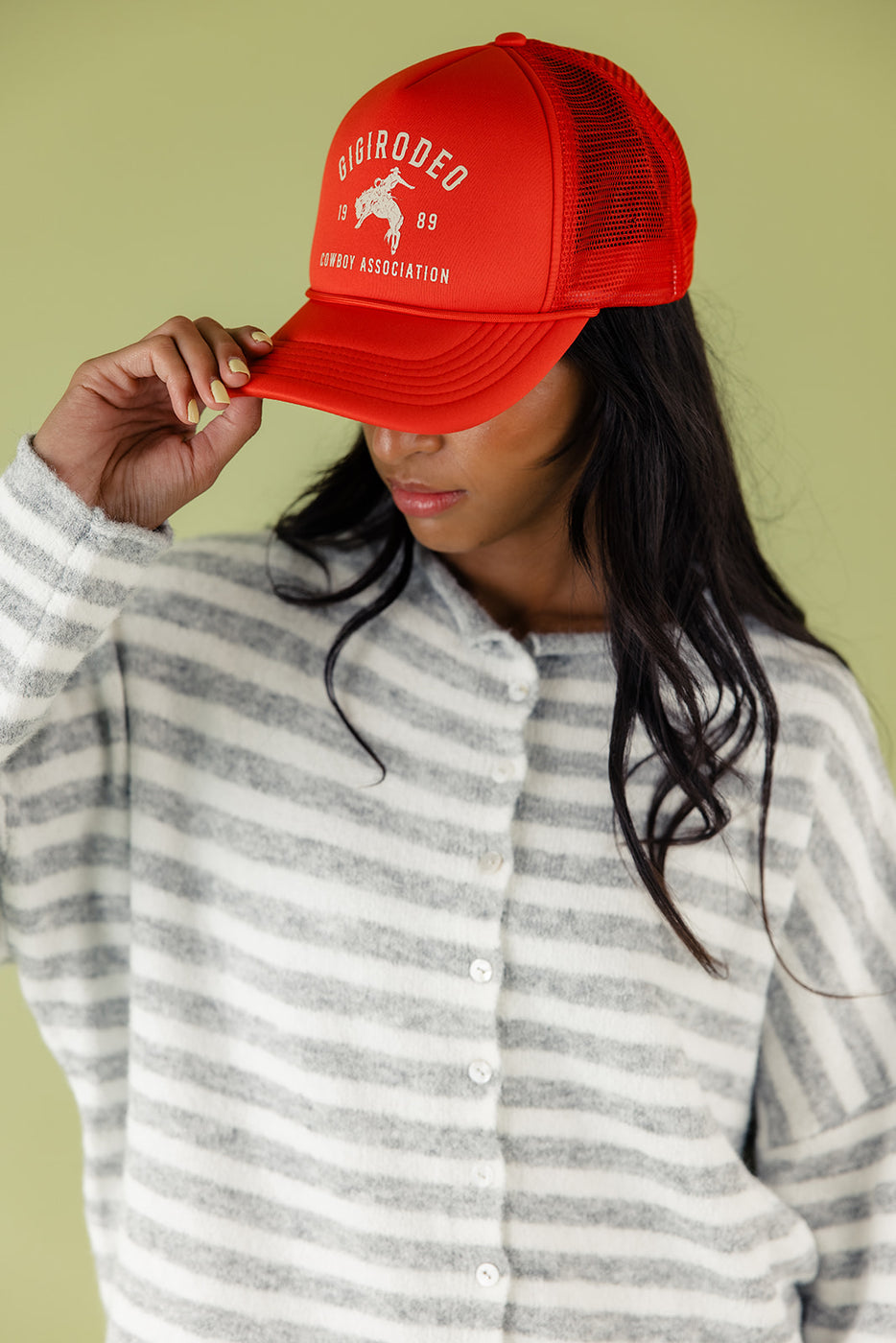 a woman wearing a red hat