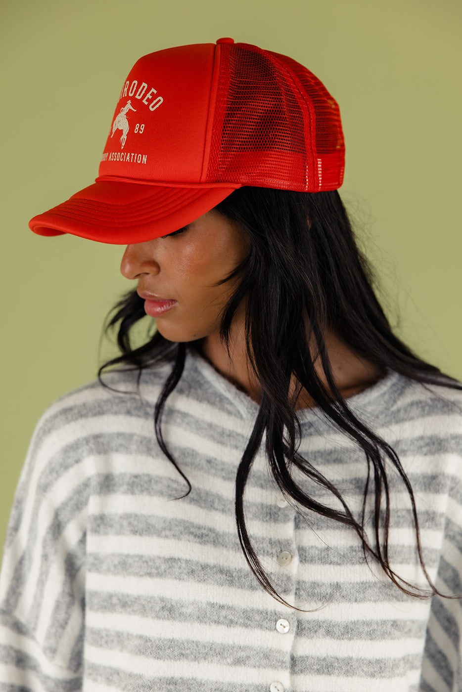 a woman wearing a red hat