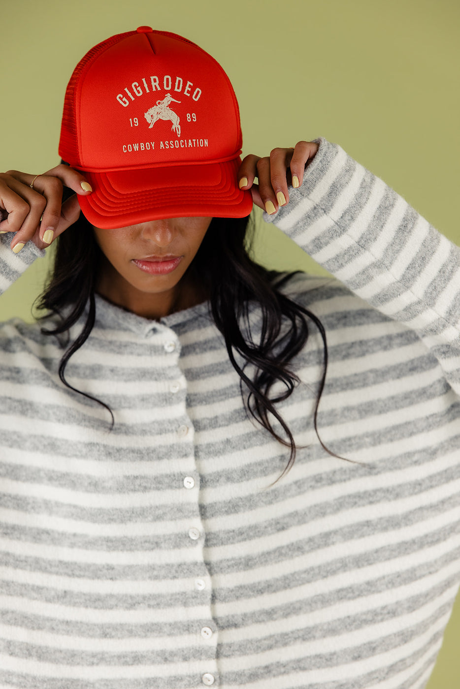 a woman wearing a red hat