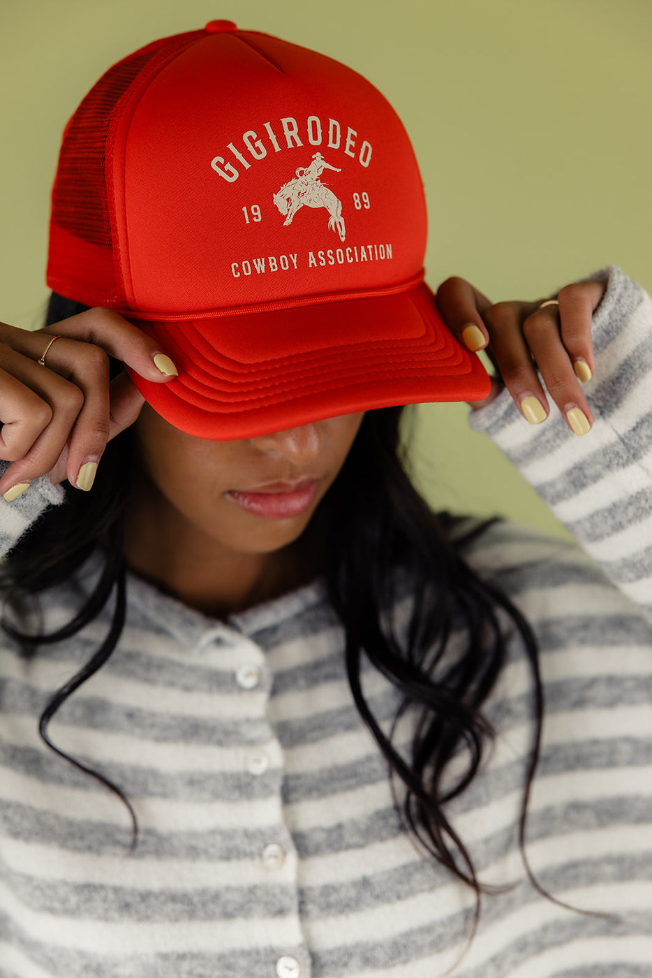 a woman wearing a red hat