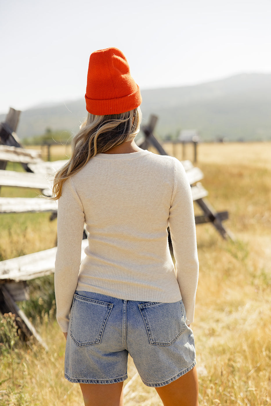 a woman in a hat