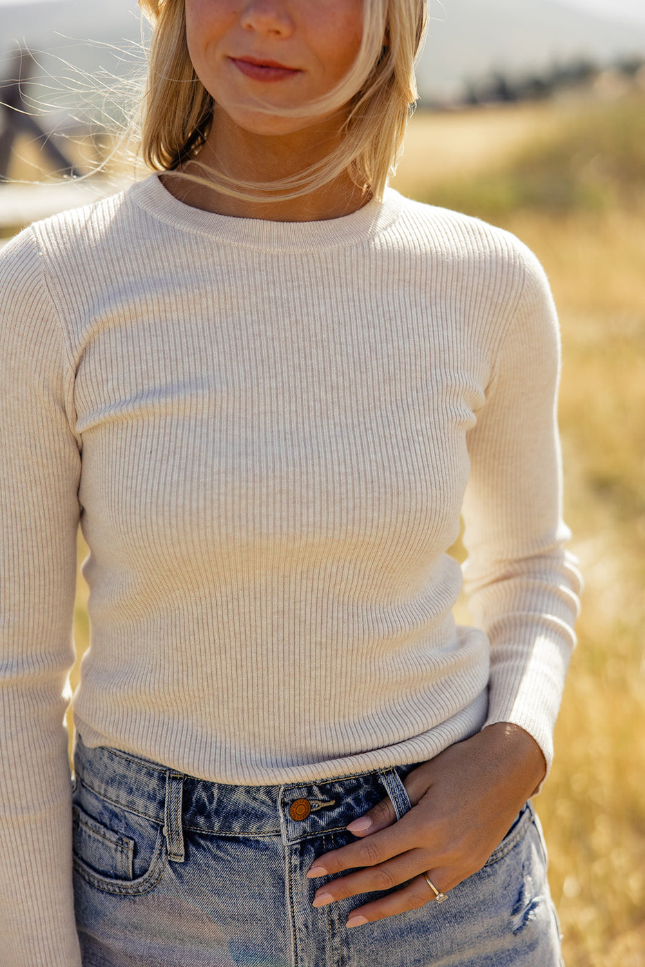 a woman wearing a white shirt