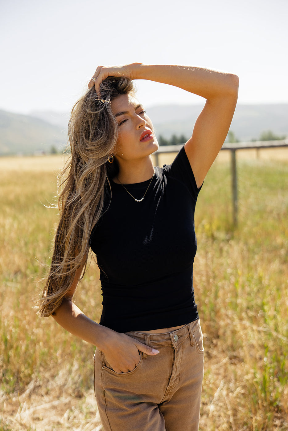 a woman in a field