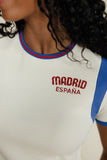 Woman wearing a white graphic tee
