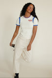 Woman modeling clothing on a white background