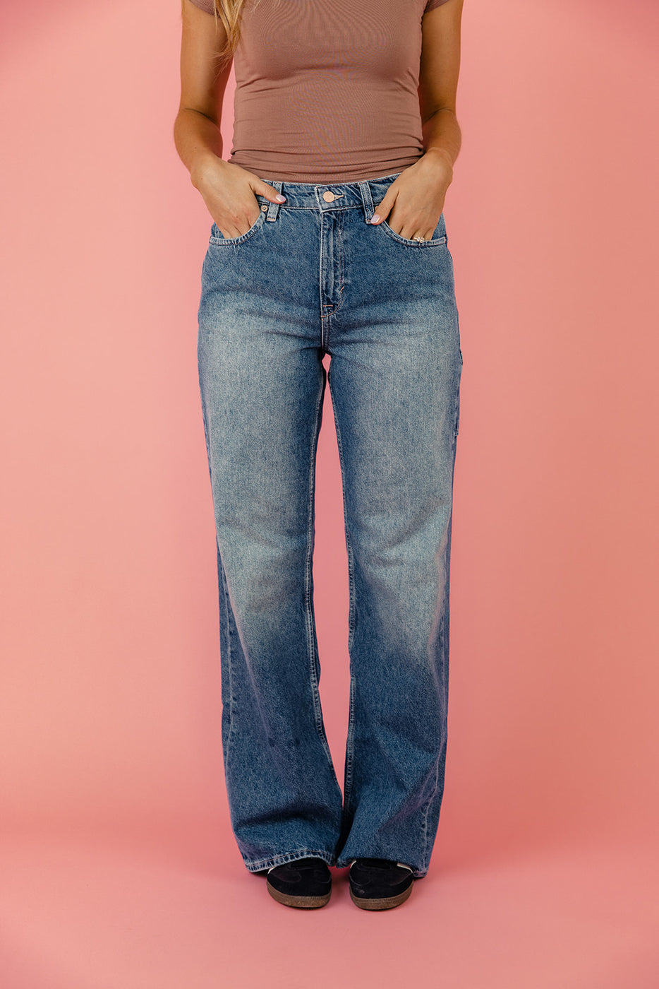 a person wearing blue jeans