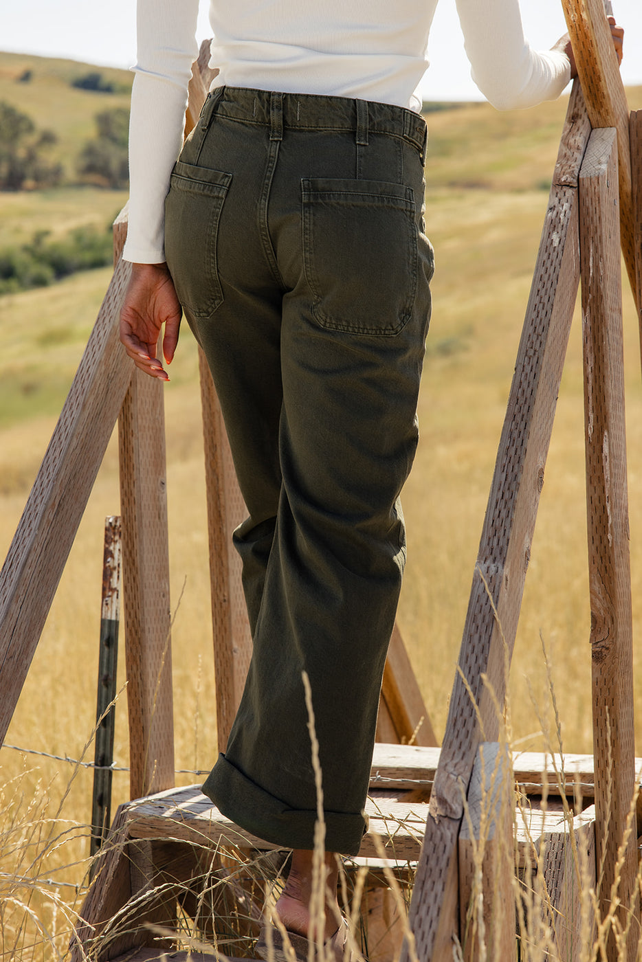 a person standing on a wooden platform