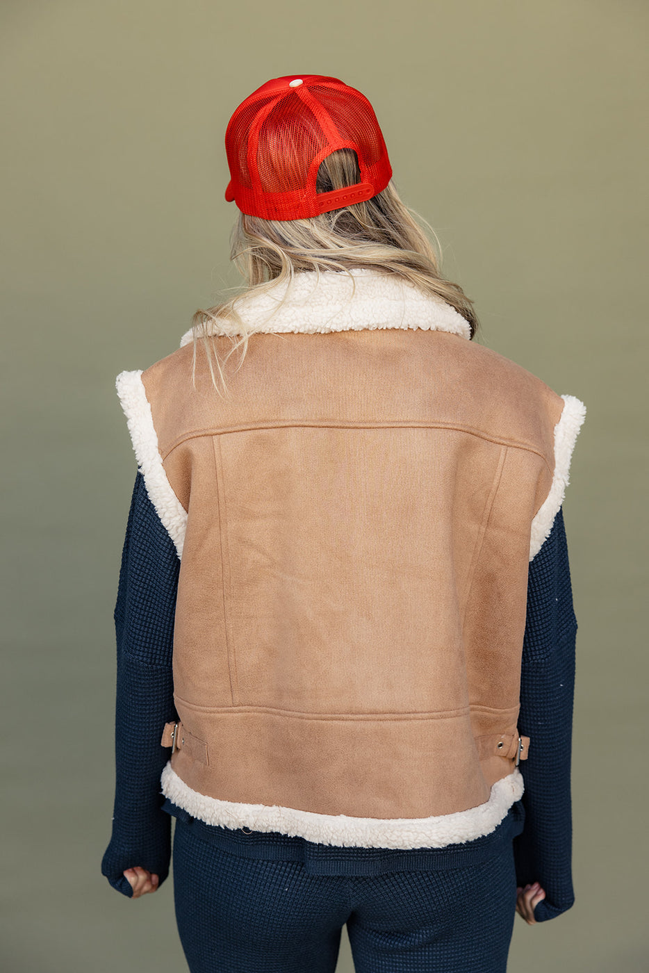 a woman wearing a red hat