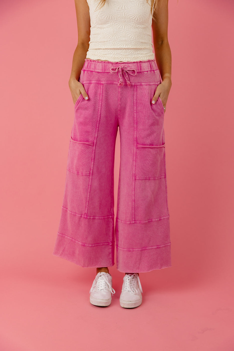 a person wearing pink pants