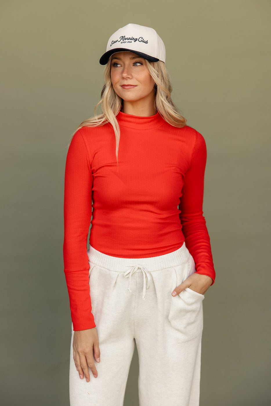 a woman in a red shirt