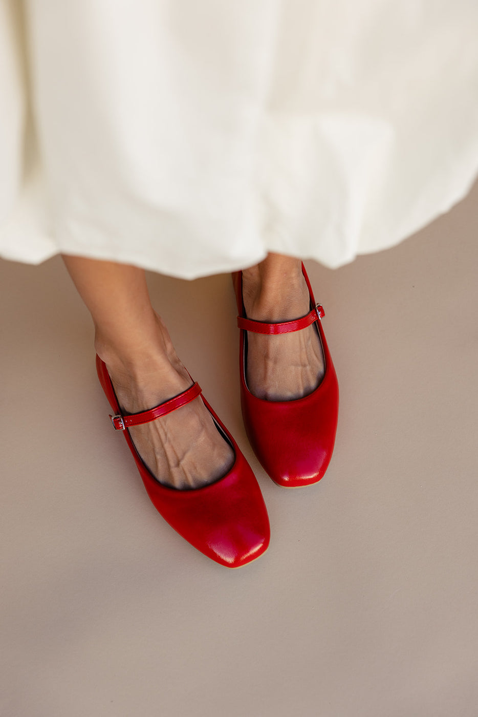 a pair of red shoes