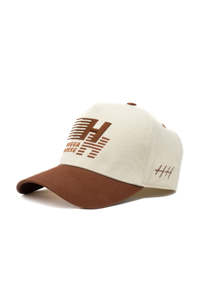 a white and brown hat