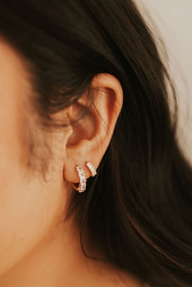 a close up of a woman's ear