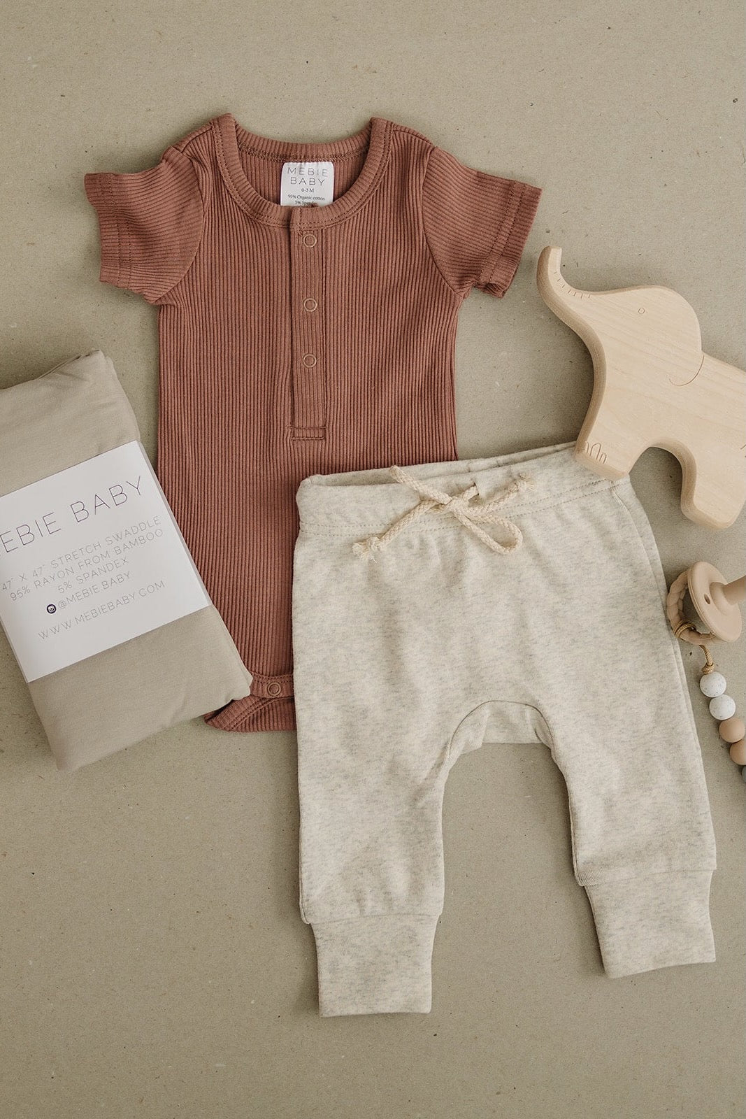 Dusty Rose Organic Cotton Ribbed Snap Bodysuit