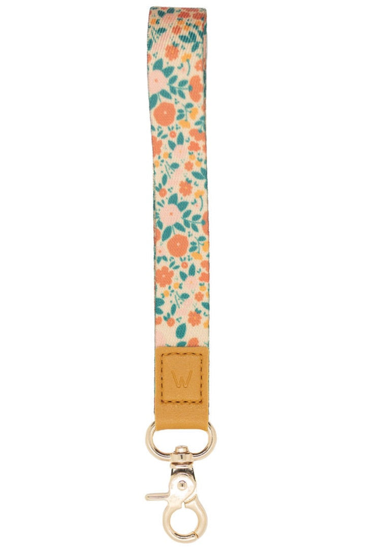a key chain with a floral pattern