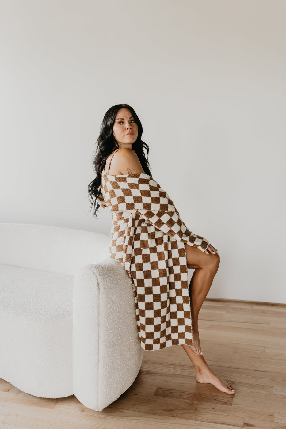 a woman sitting on a couch