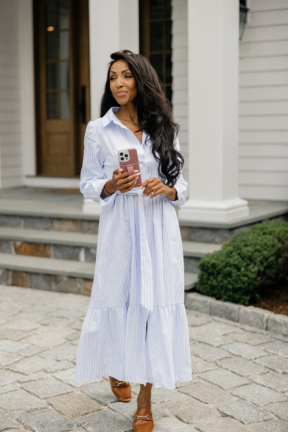 a woman in a long white dress