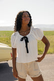 The Curtsy Bow Blouse