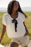 The Curtsy Bow Blouse