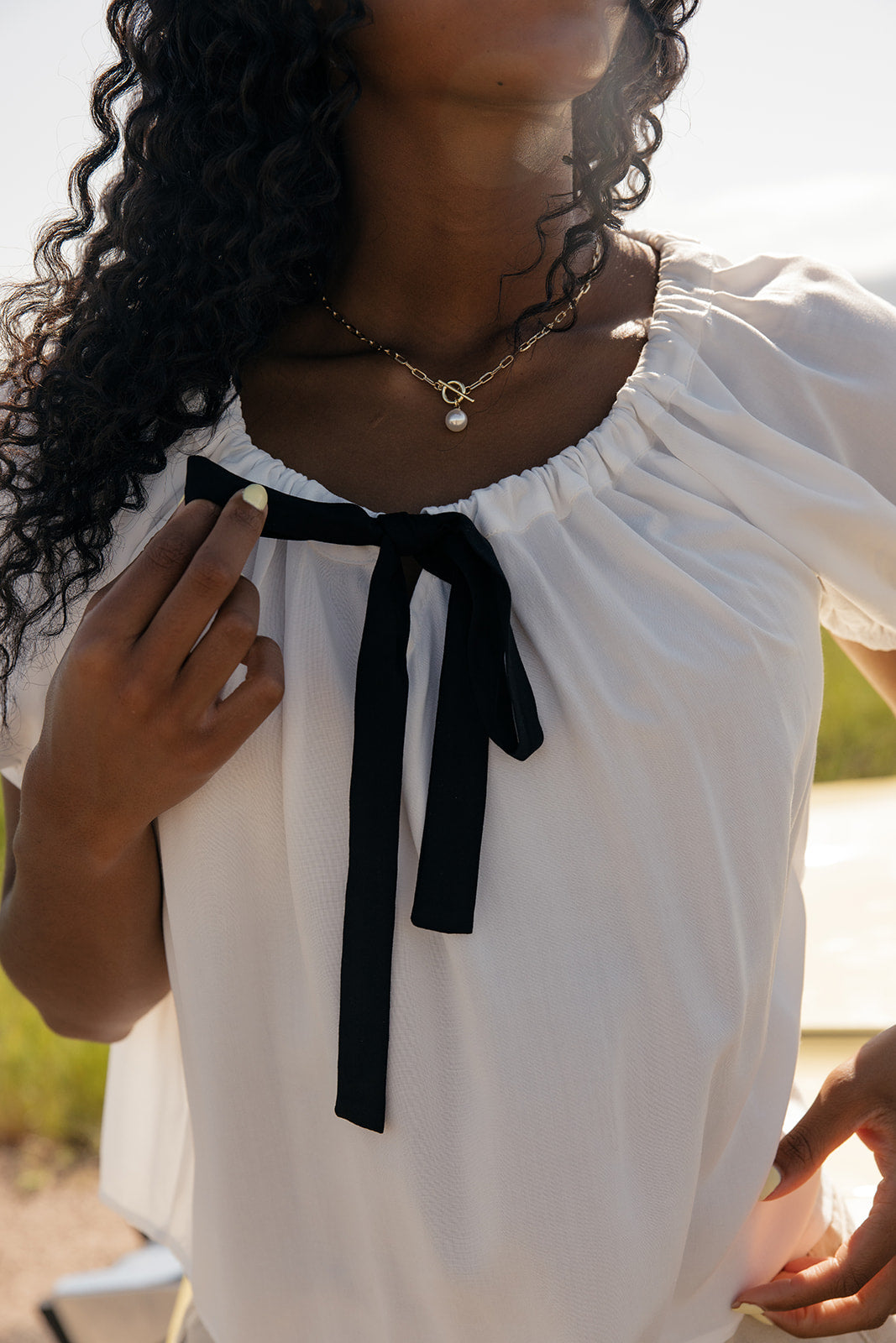 The Curtsy Bow Blouse