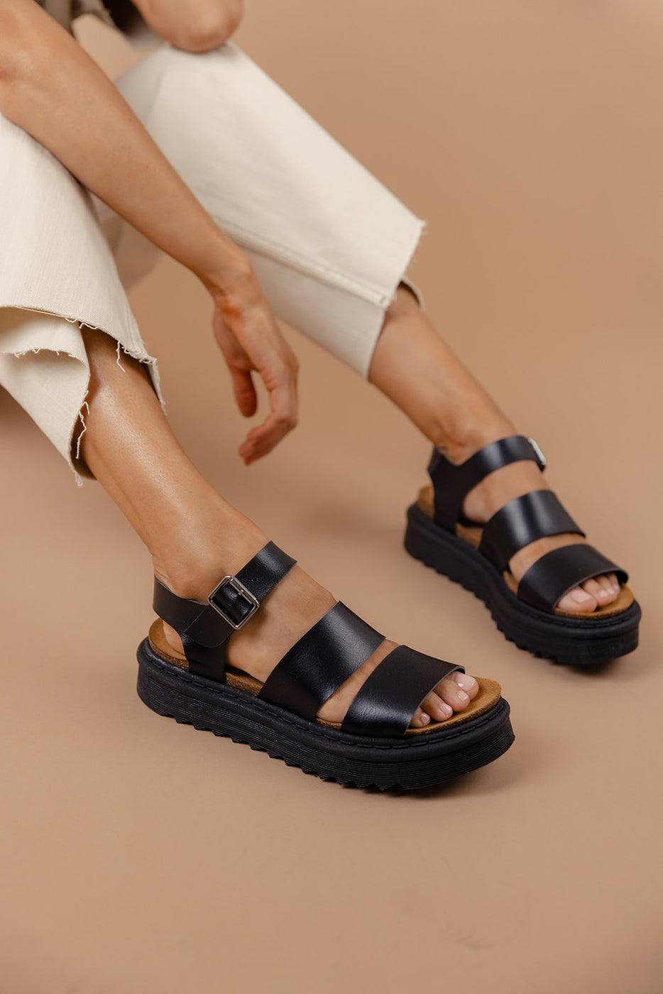 a pair of black sandals