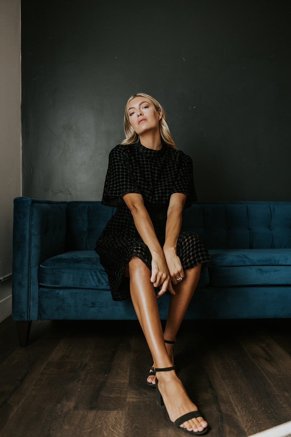 a woman sitting on a couch