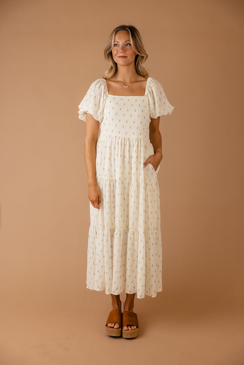 a woman in a white dress