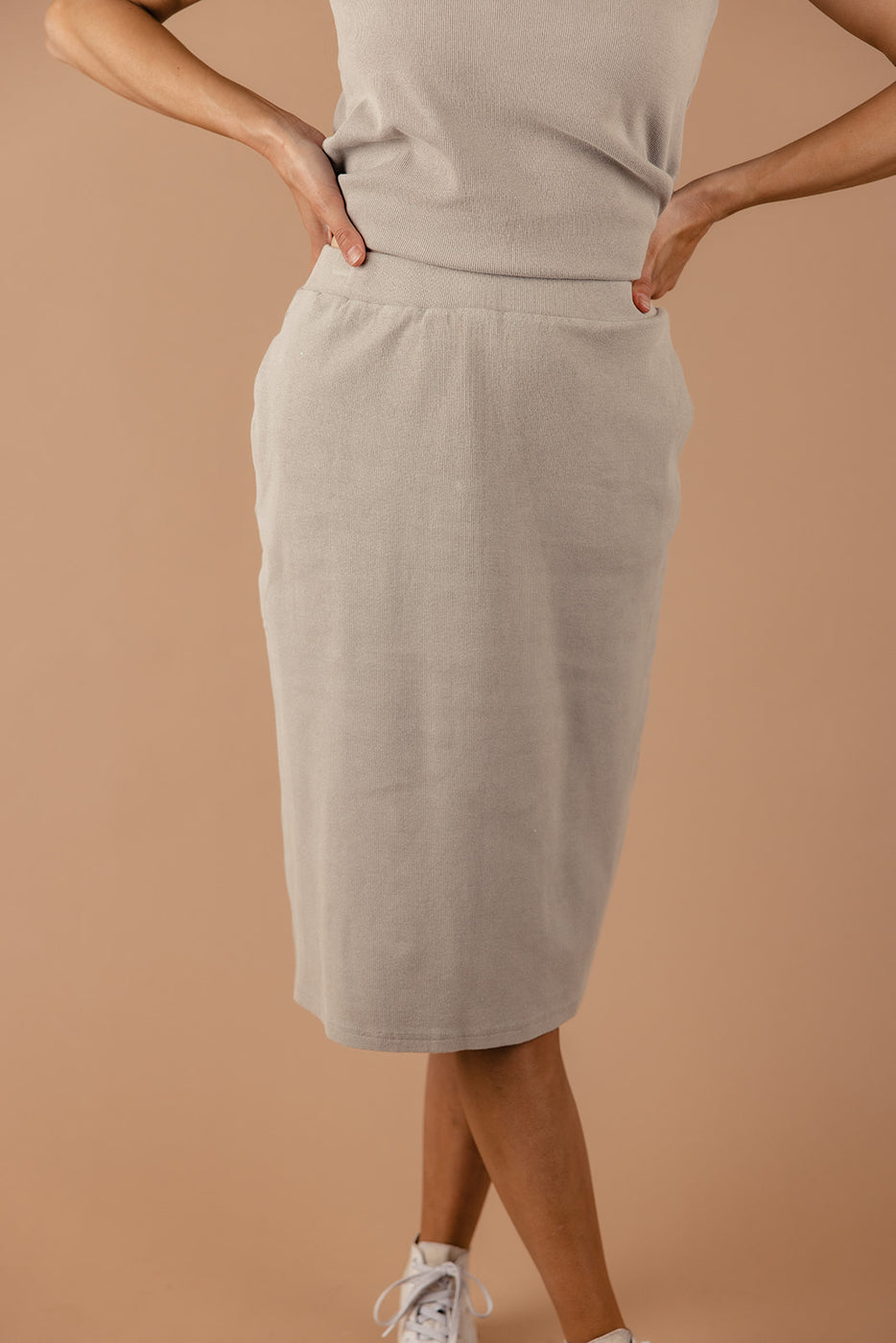 a woman wearing a skirt